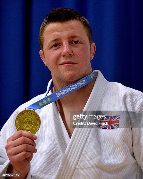 Ben Fletcher of Great Britain smilingly poses with his u100kg gold medal during the London British Open Senior European Judo Cup at the K2 Arena on...