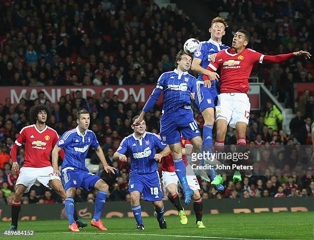 Chris Smalling of Manchester United in action with Josh Yorwerth of Ipswich Town during the Capital One Cup Third Round match between Manchester...