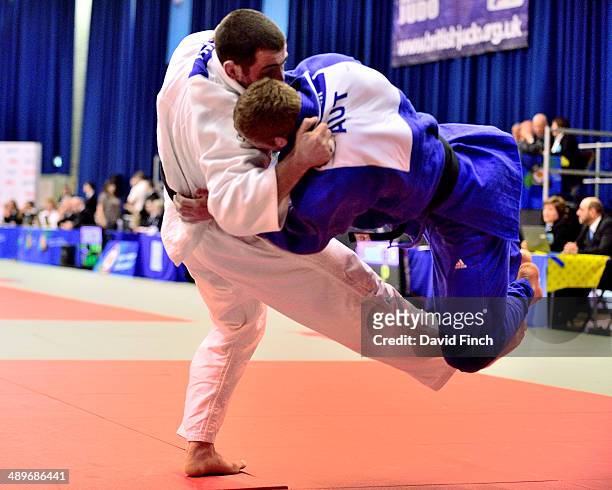 Gary Hall of Great Britain throws Christoph Mayer of Austria for a wazari to win their u100kg elimination contest during the London British Open...