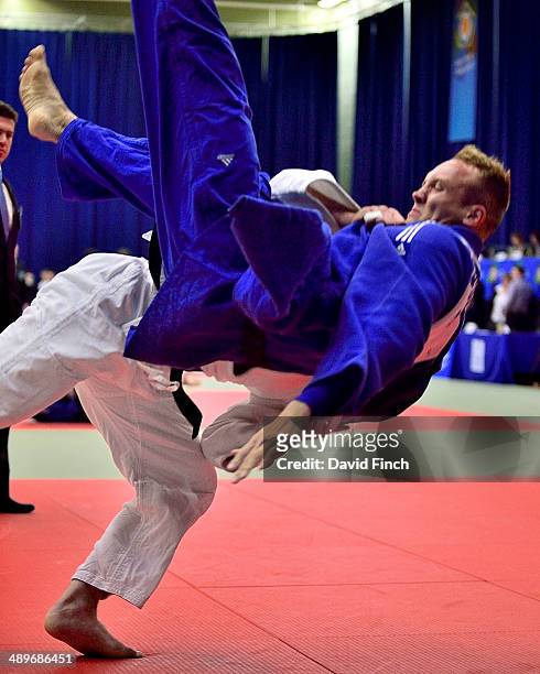 Gary Hall of Great Britain throws Bas Rosenmuller of Holland for an ippon to win their u100kg elimination contest during the London British Open...