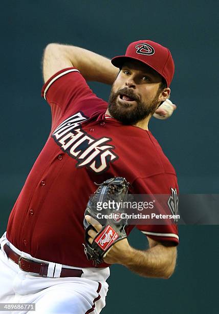 Starting pitcher Josh Collmenter of the Arizona Diamondbacks pitches against the Colorado Rockies during the MLB game at Chase Field on April 30,...