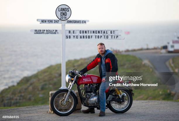 Dan Cartwright on May 11, 2014 in Land's End, England. Royal Enfield motorcycle riders took part in the 'Top to Tip' sprint ride to mark the 50th...