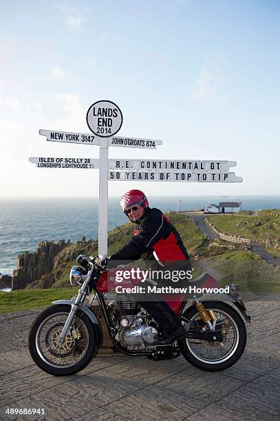 Tom Bray on May 11, 2014 in Land's End, England. Royal Enfield motorcycle riders took part in the 'Top to Tip' sprint ride to mark the 50th...