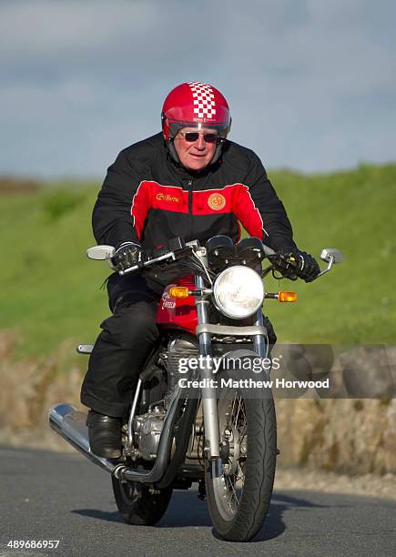 Tom Bray on May 11, 2014 in Land's End, England. Royal Enfield motorcycle riders took part in the 'Top to Tip' sprint ride to mark the 50th...