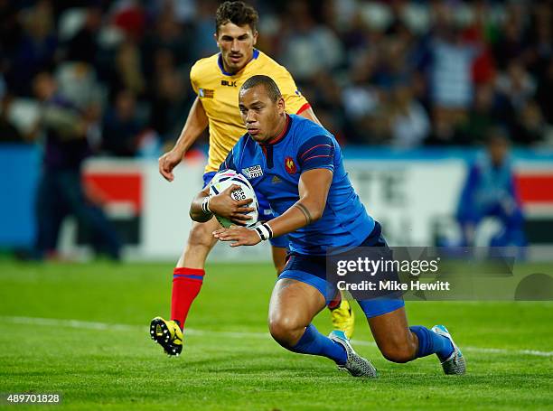 Gael Fickou of France goes over to score his teams fifth try during the 2015 Rugby World Cup Pool D match between France and Romania at the Olympic...