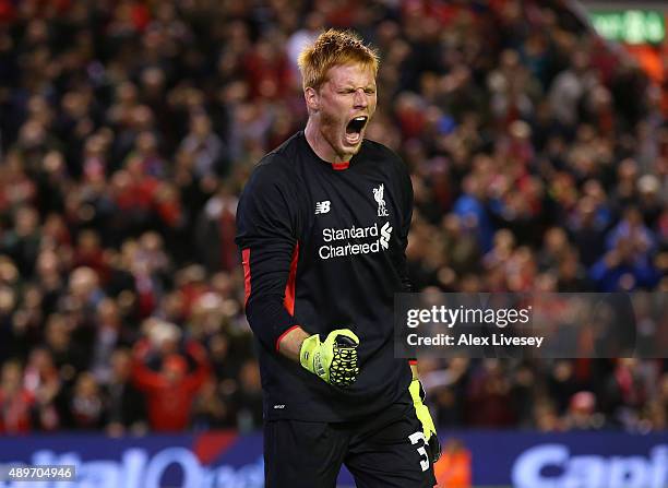 Adam Bogdan of Liverpool celebrates after saving a penalty from Danny Grainger of Carlisle United during a penalty shoot out in the Capital One Cup...