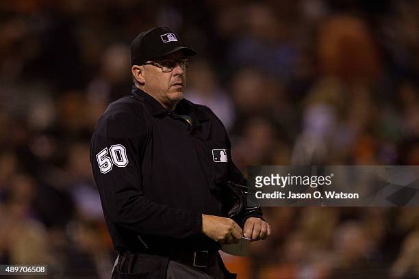 Umpire Paul Emmel stands on the field during the fifth inning between the San Francisco Giants and the Cincinnati Reds at AT&T Park on September 14,...
