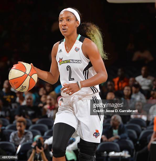 Candice Wiggins of the New York Liberty dribbles up the court against the Indiana Fever during game One of the WNBA Eastern Conference Finals at...