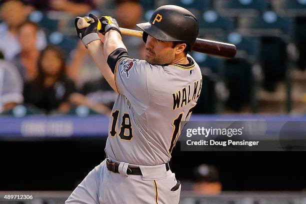 Neil Walker of the Pittsburgh Pirates hits a two RBI single off of starting pitcher Christian Bergman of the Colorado Rockies to take a 2-0 lead in...