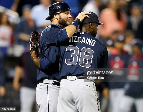 Pierzynski and Arodys Vizcaino of the Atlanta Braves celebrate the 6-3 win over the New York Mets on September 23, 2015 at Citi Field in the Flushing...