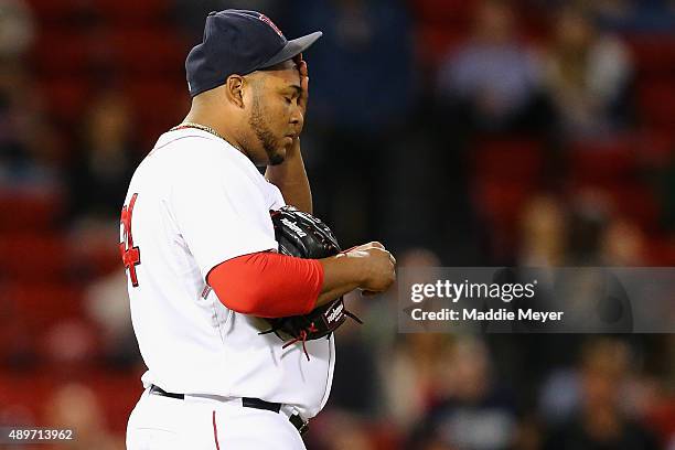 Jean Machi of the Boston Red Sox reacts after allowing Asdrubal Cabrera of the Tampa Bay Rays to hit a home run during the ninth inning at Fenway...