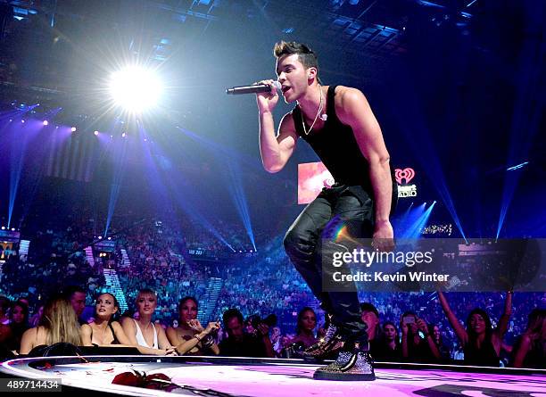 Singer Prince Royce performs at the 2015 iHeartRadio Music Festival at the MGM Grand Garden Arena on September 19, 2015 in Las Vegas, Nevada.