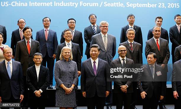Chinese President Xi Jinping poses with CEOs and other company executives at the main campus of Microsoft Corp. September 23, 2015 in Redmond,...