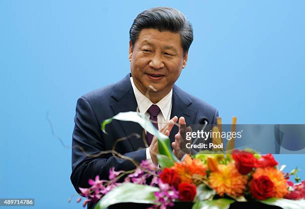 Chinese President Xi Jinping speaks at a gathering of CEOs and other executives at the main campus of Microsoft Corp. September 23, 2015 in Redmond,...