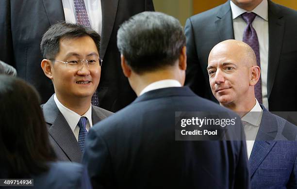 Amazon.com CEO Jeff Bezos and Tencent founder Pony Ma talks with Chinese President Xi Jinping at the main campus of Microsoft Corp. September 23,...