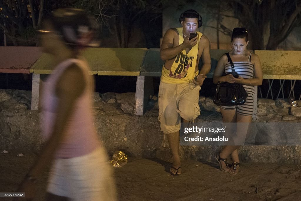 Cubans gather around Wifi hot spots