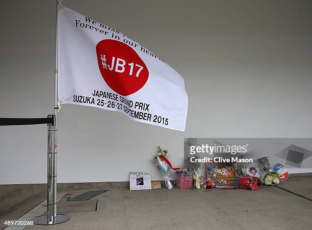 Tributes to the late formula one driver Jules Bianchi in the pit lane next to the Manor Marussia garage during previews to the Formula One Grand Prix...