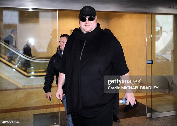 Kim Dotcom leaves court for the day after attending his extradition hearing in Auckland on September 24, 2015. Internet mogul Kim Dotcom's...