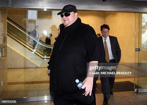 Kim Dotcom leaves court for the day after attending his extradition hearing in Auckland on September 24, 2015. Internet mogul Kim Dotcom's...