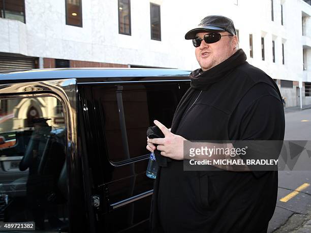 Kim Dotcom leaves court for the day after attending his extradition hearing in Auckland on September 24, 2015. Internet mogul Kim Dotcom's...