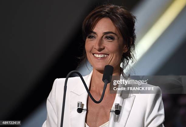 Jounalist Nathalie Iannetta is pictured during TV show "Canal Football Club" on May 11, 2014 in Paris, as part of the 23th edition of the UNFP trophy...