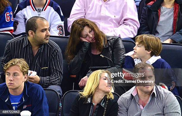 Linda Evangelista and son Augustin James Evangelista attend the Pittsburgh Penguins vs New York Rangers at Madison Square Garden on May 11, 2014 in...