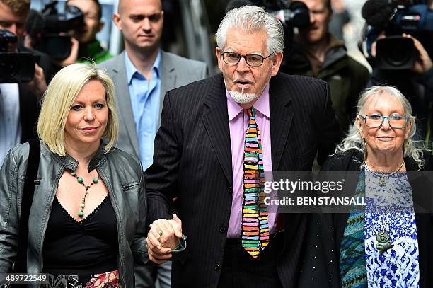 Veteran Australian artist and entertainer Rolf Harris arrives with his wife Alwen Hughes and daughter Bindi at Southwark Crown Court in central...