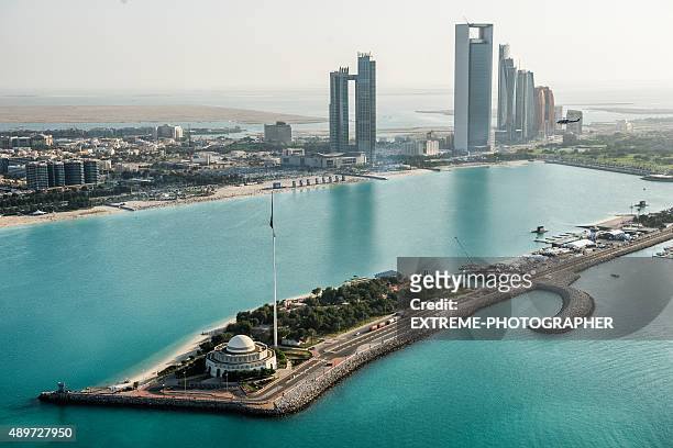 mosque and coastline in abu dhabi - abu dhabi stock pictures, royalty-free photos & images