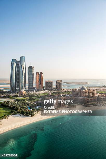 skyscrapers and coastline in abu dhabi - abu dhabi stockfoto's en -beelden