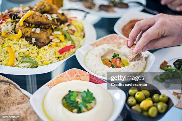 table full of mezze - dubai food stock pictures, royalty-free photos & images