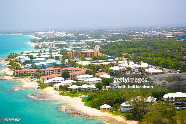 aerial view of coastline of grand cayman, cayman islands - cayman islands stock pictures, royalty-free photos & images