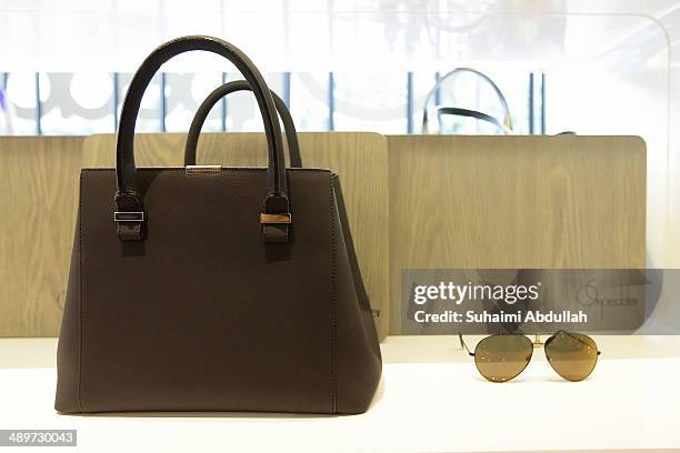 Handbag and sunglass of Victoria Beckham label are seen at On Pedder at Scotts Square on May 12, 2014 in Singapore. Victoria Beckham is in Singapore...