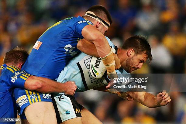 Beau Ryan of the Sharks is tackled during the round nine NRL match between the Parramatta Eels and the Cronulla-Sutherland Sharks at Pirtek Stadium...