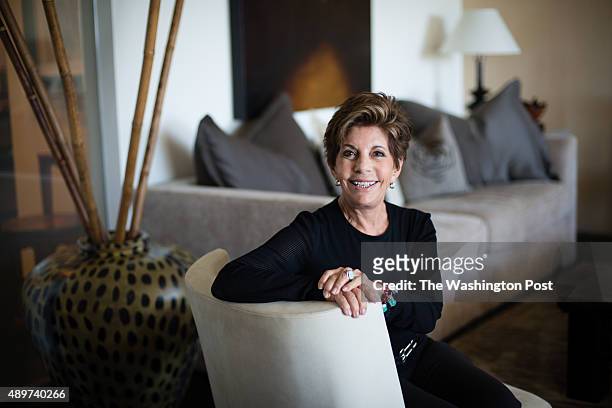 Nancy Conrad sits in the living room of her extensively renovated condo in the Watergate building on August 22, 2015.