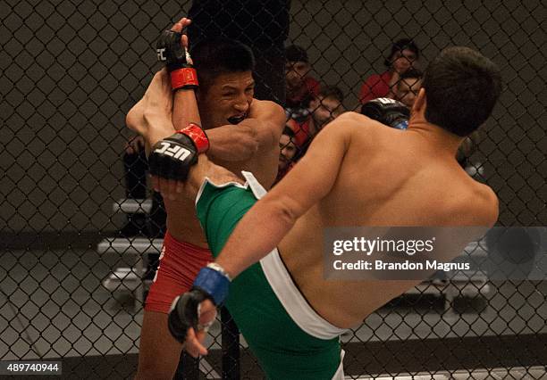 Jonathan Ortega kicks Enrique Barzola during the filming of The Ultimate Fighter Latin America: Team Gastelum vs Team Escudero on April 7, 2015 in...