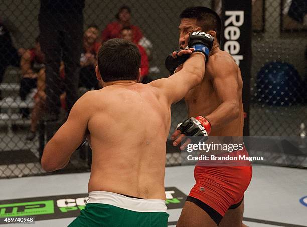 Jonathan Ortega punches Enrique Barzola during the filming of The Ultimate Fighter Latin America: Team Gastelum vs Team Escudero on April 7, 2015 in...