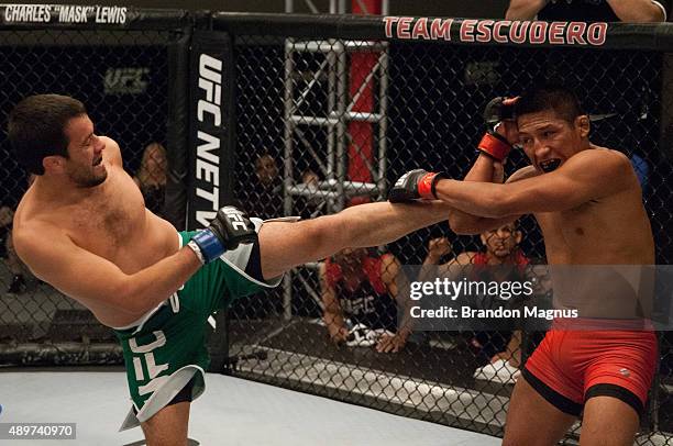 Jonathan Ortega kicks Enrique Barzola during the filming of The Ultimate Fighter Latin America: Team Gastelum vs Team Escudero on April 7, 2015 in...