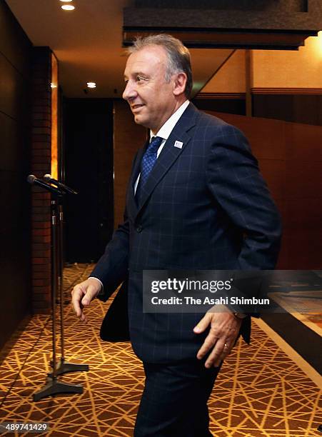 Head coach Alberto Zaccheroni leaves a room after announcing the Japan squad for the 2014 FIFA World Cup during a news conference at Grand Prince...