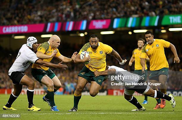 Sekope Kepu of Australia bursts through a tackle for his try during the 2015 Rugby World Cup Pool A match between Australia and Fiji at Millennium...