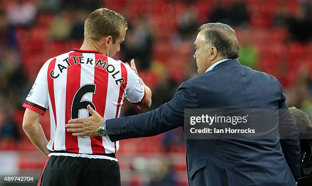 Sunderland head coach Dick Advocaat instructs Lee Cattermole during the Capital One Cup Third Round match between Sunderland and Manchester City at...