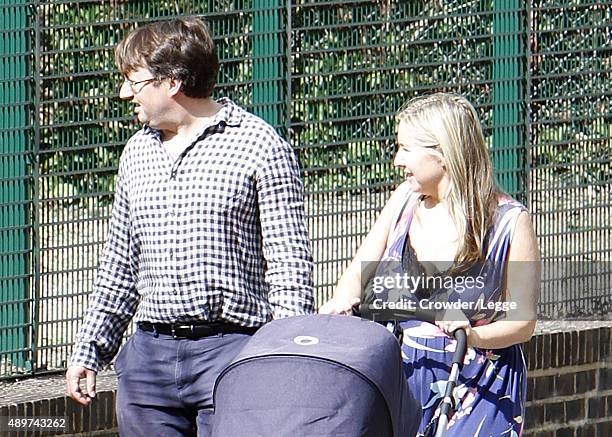 David Mitchell and wife Victoria Coren Mitchell taking a stroll on September 12, 2015 in London, England.