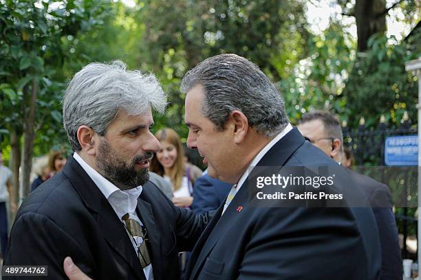 Panos Kammenos , the Greek Minister for National Defence, talks with a supporter after the swearing-in ceremony. The new cabinet ministers under the...