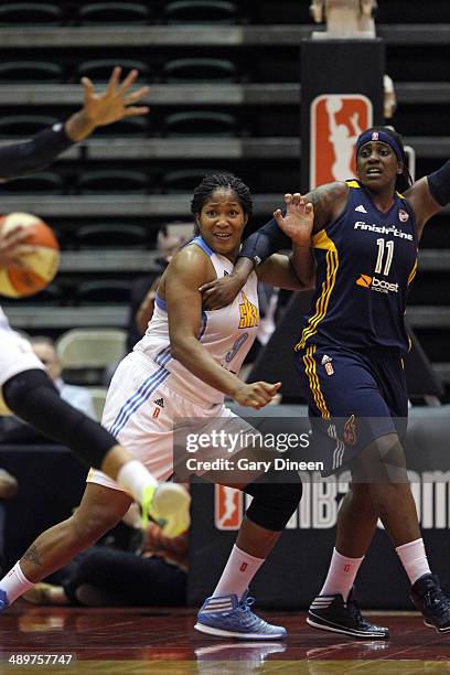 Markeisha Gatling of the Chicago Sky defends against Lynetta Kizer of the Indiana Fever as part of the WNBA Preseason Tournament 2014 on May 9, 2014...