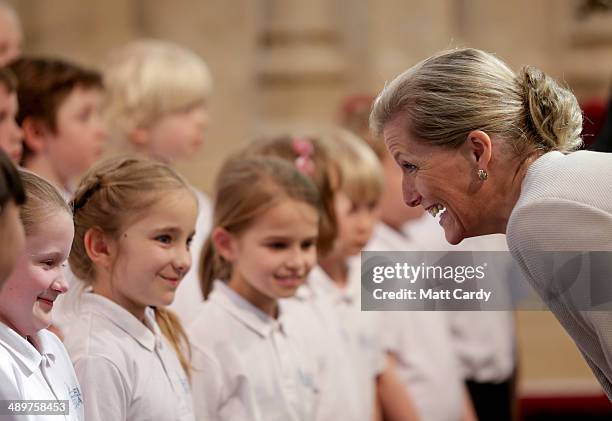 Sophie, Countess of Wessex talks to members of the Melody Makers children's choir during an official visit to Bath Abbey on May 12, 2014 in Bath,...