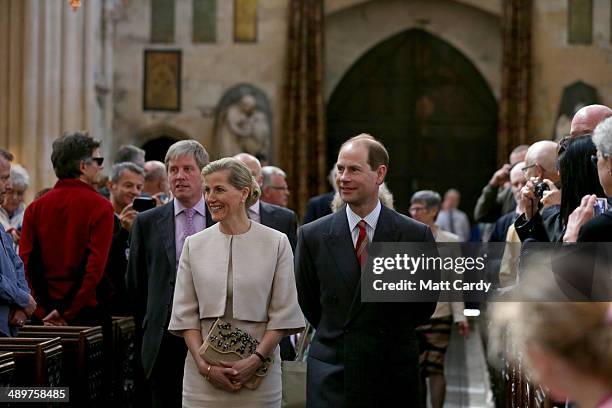 Prince Edward, Earl of Wessex and Sophie, Countess of Wessex walk down the main nave during an official visit to Bath Abbey on May 12, 2014 in Bath,...