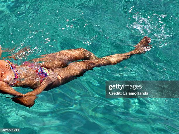 a nice girl swimming in mallorca - women with nice legs bildbanksfoton och bilder