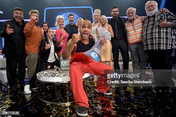 Winner David Odonkor and the other participants react after the final show of Promi Big Brother 2015 at MMC studios on August 28, 2015 in Cologne,...