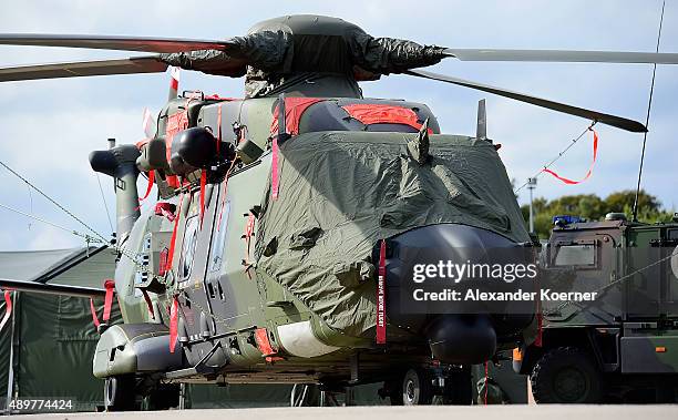 The NH-90 Helicopter of the German Armed Forces is pictured at a Bundeswehr training ground on September 24, 2015 in Munster, Germany. German Defense...