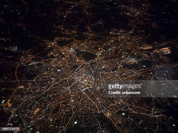 aerial view of brussels at night - city stockfoto's en -beelden