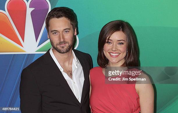 Actors Ryan Eggold and Megan Boone from "The Blacklist" attend the 2014 NBC Upfront Presentation at The Jacob K. Javits Convention Center on May 12,...